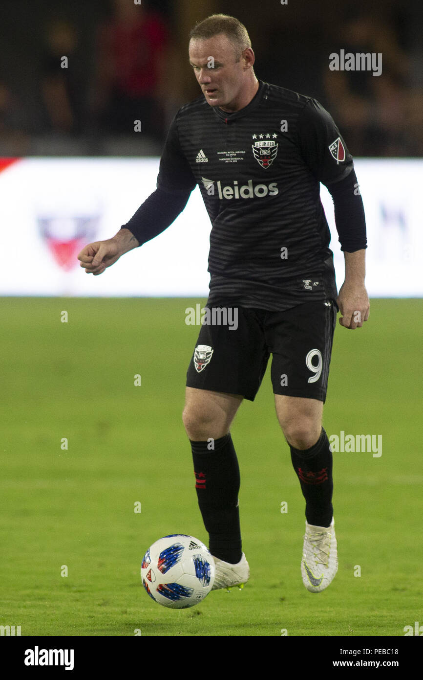 Washington, District of Columbia, USA. 14th July, 2018. D.C. United forward Wayne Rooney (9) dribbles during the game between D.C. United and Vancouver Whitecaps at Audi Filed in Washington, DC on July 14, 2018. D.C. This is D.C. United's first game at Audi Field. Credit: Alex Edelman/ZUMA Wire/Alamy Live News Stock Photo