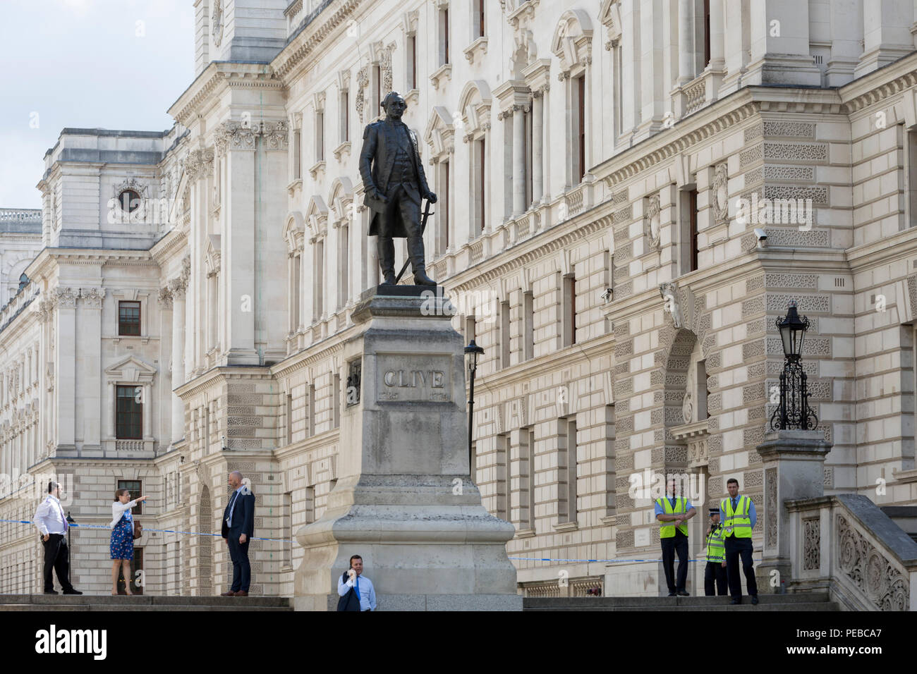 London, UK 14th August 2018: The Foreign Office in King Charles Street is blocked as Westminster experiences a lockdown with extensive cordons and the closure of many streets after what police are calling a terrorist incident in which a car was crashed into security barriers outside parliament in central London, on 14th August 2018, in London, England. Photo by Richard Baker / Alamy Live News. Stock Photo