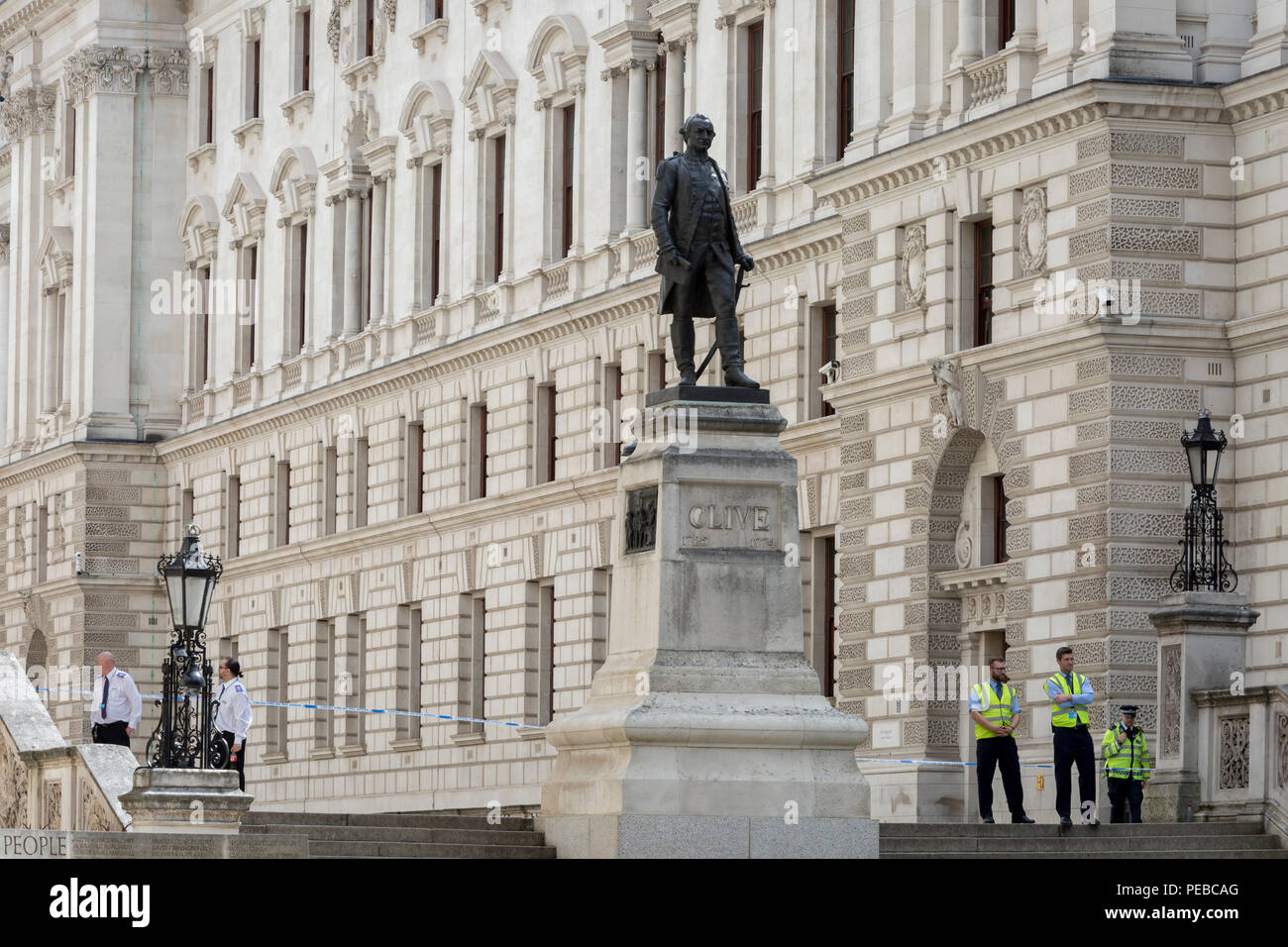London, UK 14th August 2018: The Foreign Office in King Charles Street is blocked as Westminster experiences a lockdown with extensive cordons and the closure of many streets after what police are calling a terrorist incident in which a car was crashed into security barriers outside parliament in central London, on 14th August 2018, in London, England. Photo by Richard Baker / Alamy Live News. Stock Photo