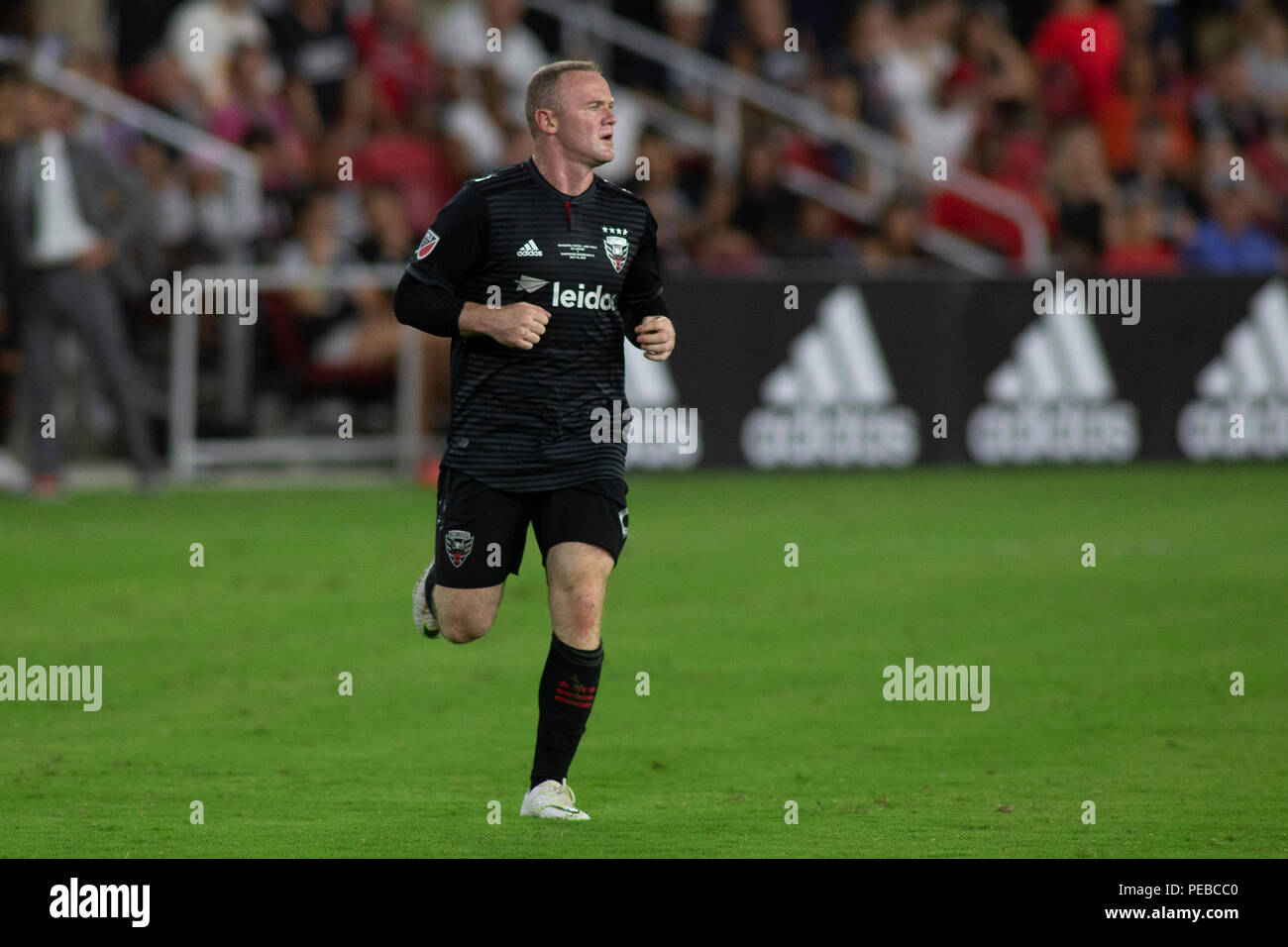 Washington, United States. 14th July, 2018. D.C. United forward Wayne Rooney (9) runs during the game between D.C. United and Vancouver Whitecaps at Audi Filed in Washington, DC on July 14, 2018. D.C. This is D.C. United's first game at Audi Field. Credit: The Photo Access/Alamy Live News Stock Photo