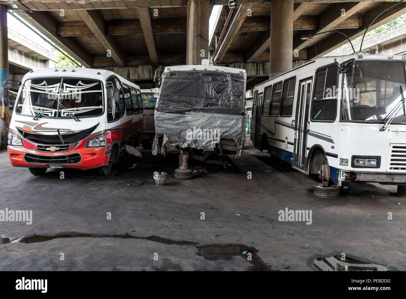 10 August 2018, Venezuela, Caracas: Buses that used to be part of 