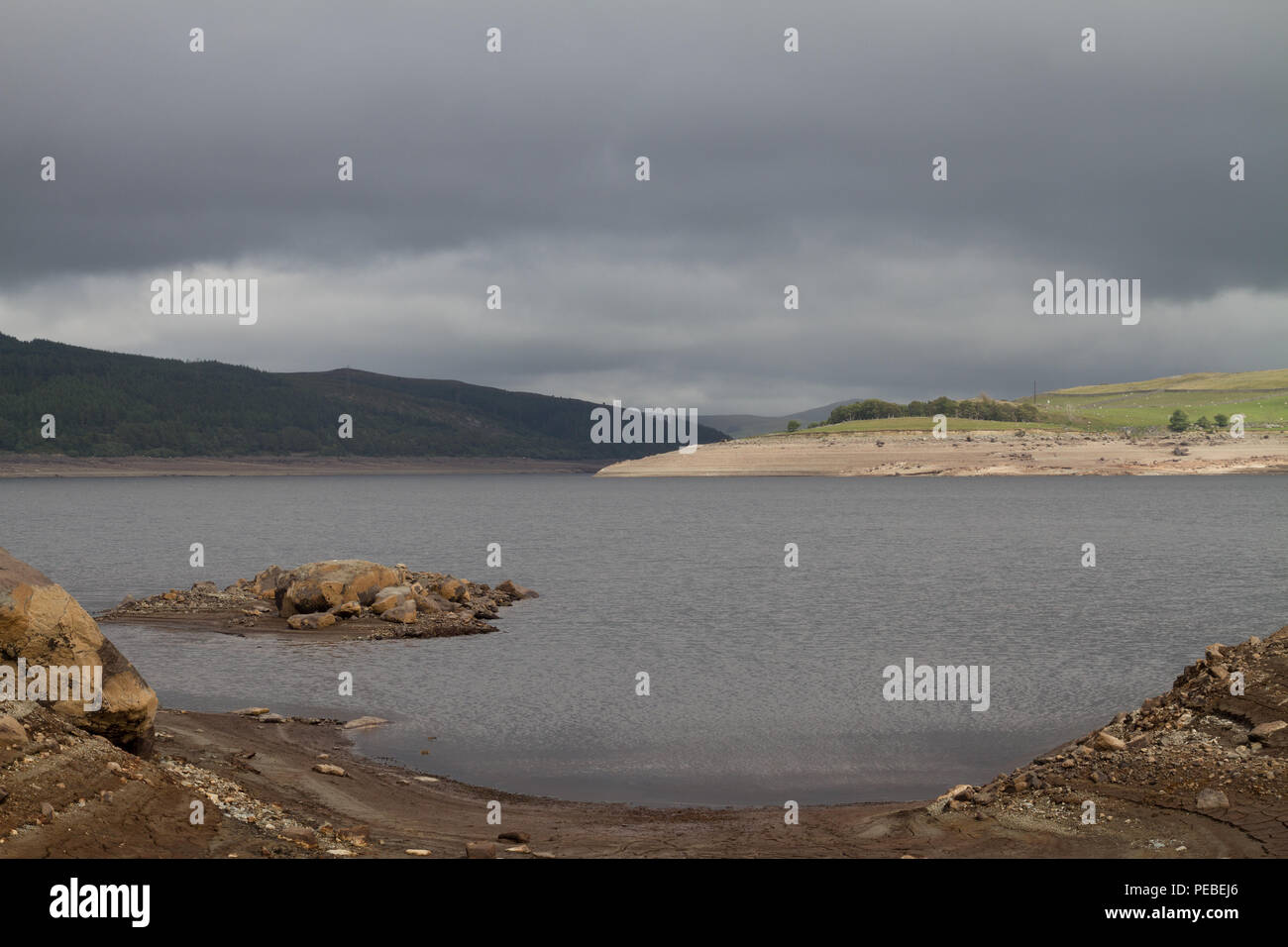 Llyn Celyn, North Wales. 14th Aug 2018. UK Weather. Usually underwater this view shows how low the water level remains low at Llyn Celyn Reservoir dispite recent rain. Credit: Charles Allen/Alamy Live News Stock Photo