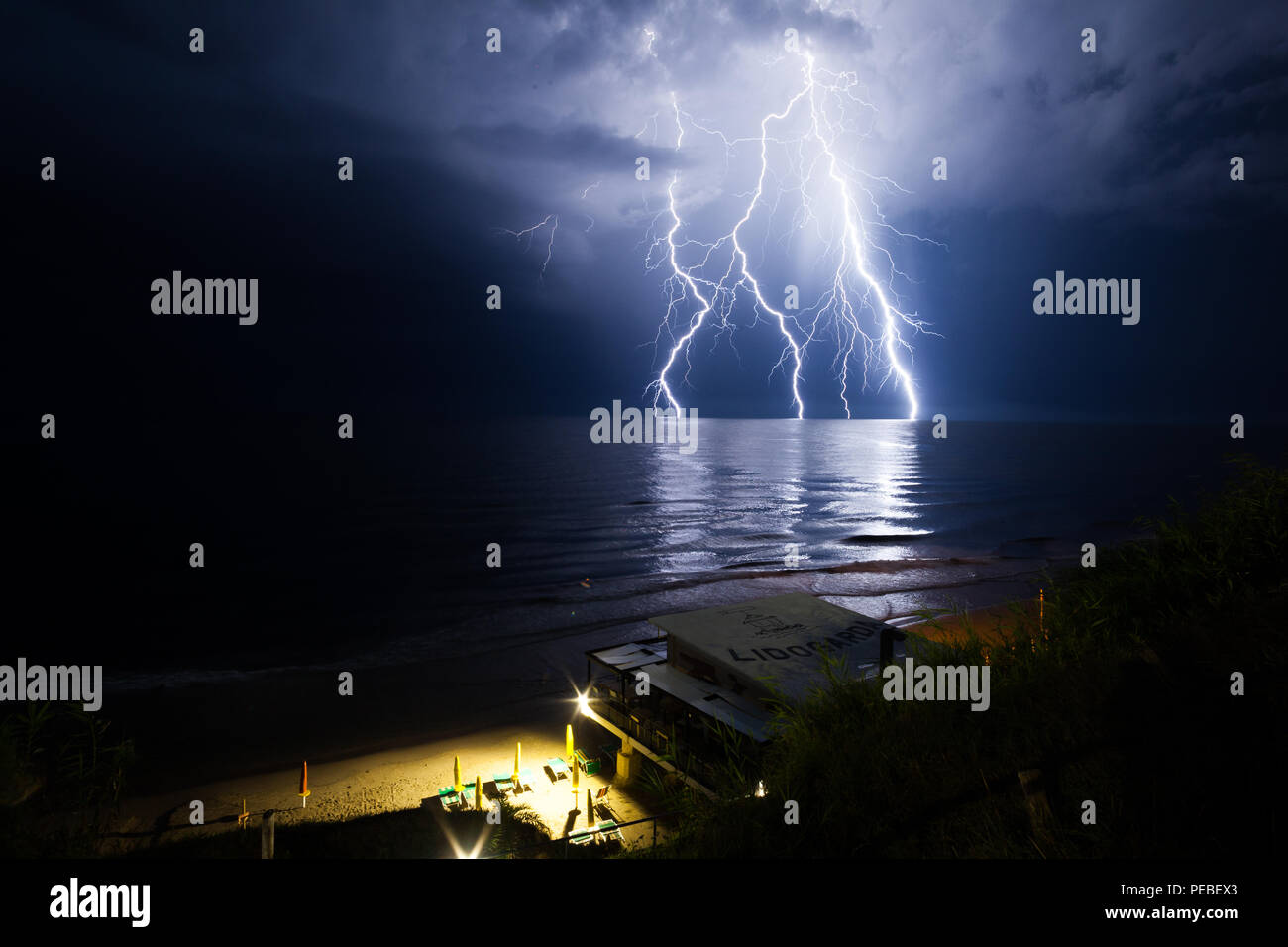 Anzio, Rome, Italy, 14th Aug, 2018. Italy weather. A strong storm has been falling for several hours on the coast near Rome. Hundreds of lightning fell on the whole region. Credit: Yves Trenet/Alamy Live News Stock Photo