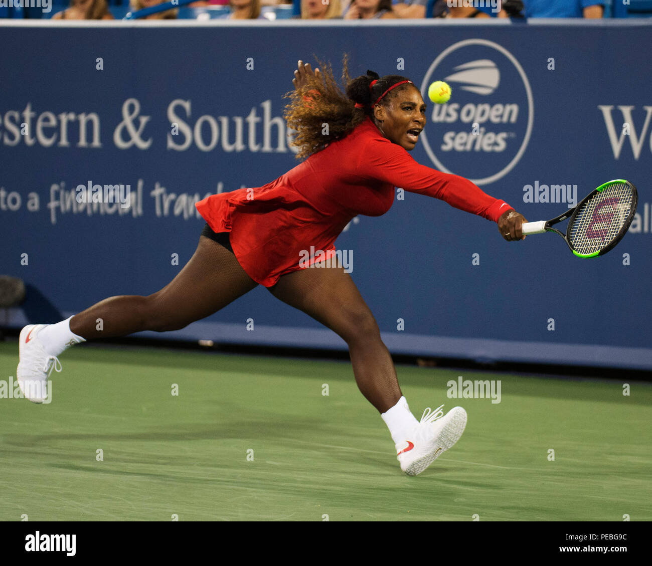Mason, Ohio, USA. August 14, 2018:  Serena Williams (USA) hits the ball back to Petra Kvitova (CZE) at the Western Southern Open in Mason, Ohio, USA. Brent Clark/Alamy Live News Stock Photo