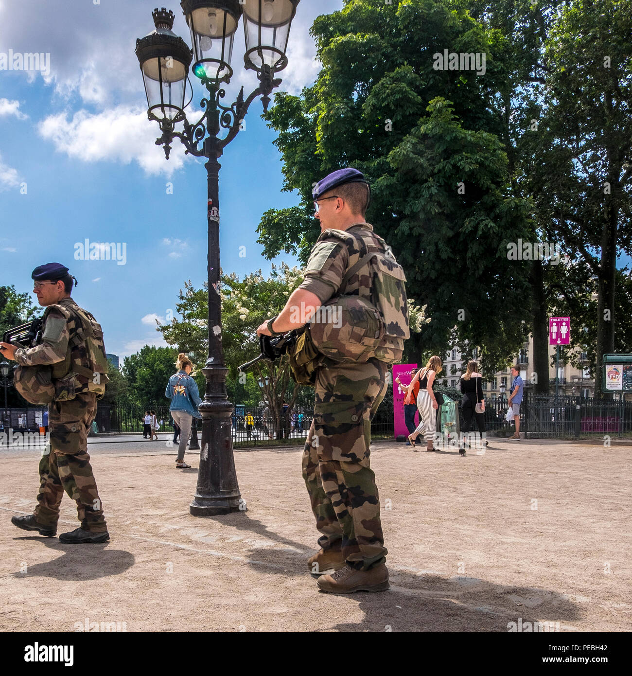 french armed forces security patrolling notre dam cathedral, paris, france Stock Photo