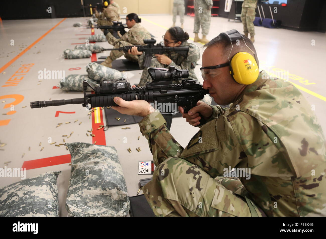 Soldiers assigned to the 55th Signal Company (Combat Camera) fire their ...