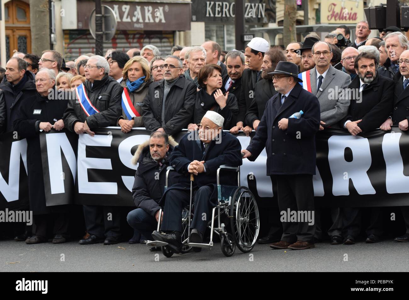 January 11, 2015 - Paris, France:  French politicians from across the political spectrum take part in a unity march following the deadly Paris attacks. Four million people demonstrated across the country in a 'Marche Republicaine' (Republican March) celebrating the nation's unity in face of terrorist threats. Thousands of people had banners or cartoons referring to Charlie Hebdo, the satirical magazine whose office was targeted by Islamist gunmen earlier in the week. La grande marche republicaine en hommage aux victimes de l'attentat contre Charlie Hebdo a rassemble pres de 2 millions de perso Stock Photo