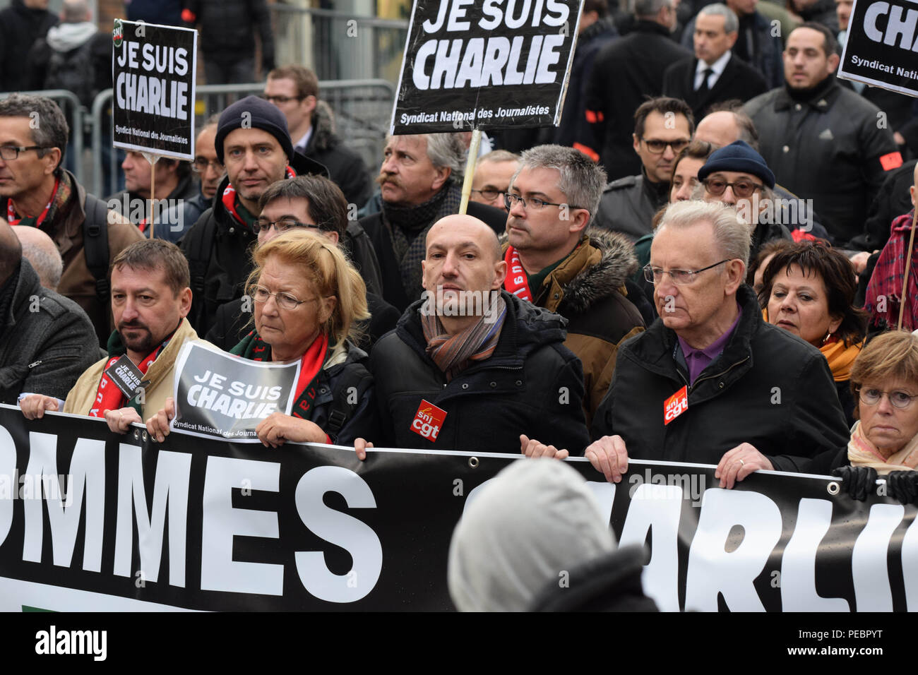 January 11, 2015 - Paris, France:  French journalists take part in a unity march following the deadly Paris attacks. Four million people demonstrated across the country in a 'Marche Republicaine' (Republican March) celebrating the nation's unity in face of terrorist threats. Thousands of people had banners or cartoons referring to Charlie Hebdo, the satirical magazine whose office was targeted by Islamist gunmen earlier in the week. La grande marche republicaine en hommage aux victimes de l'attentat contre Charlie Hebdo a rassemble pres de 2 millions de personnes dans les rues de Paris. Il s'a Stock Photo