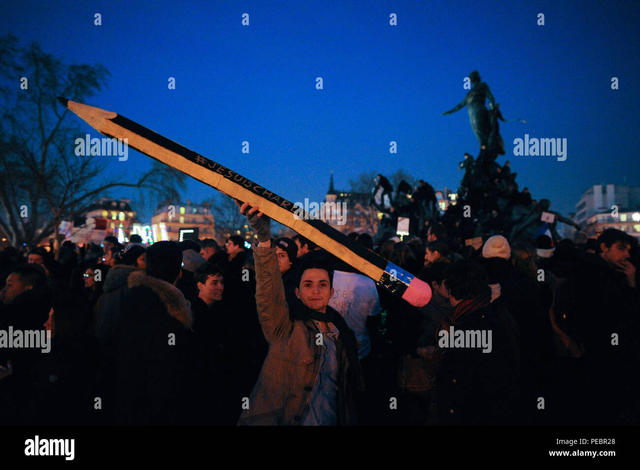 January 11, 2015 - Paris, France:  More than 1,5 million people take part in a march to support Freedom of expression and protest against terrorism in the French capital after three days of terror left 17 people dead. Four million people demonstrated across the country in a 'Marche Republicaine' (Republican March) celebrating the nation's unity in face of terrorist threats. Thousands of people had banners or cartoons referring to Charlie Hebdo, the satirical magazine whose office was targeted by Islamist gunmen earlier in the week. La grande marche republicaine en hommage aux victimes de l'att Stock Photo