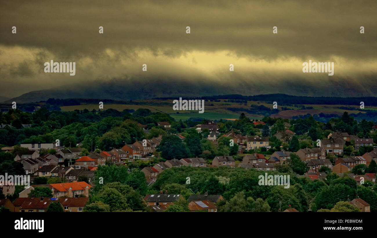 Wet misty day ahead as stormy Debby changes weather and the mist and heavy rain cloud roll off the Campsie fells hills into Bearsden in the suburbs Stock Photo