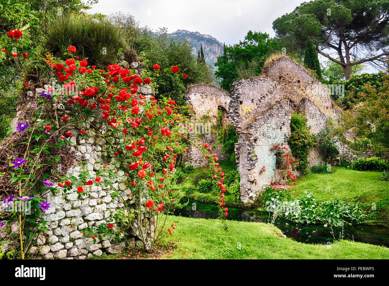 The Ninfa Garden with Historic Ruins and Blooming Flowers, Cisterna di Latina , Lazio,Italy Stock Photo