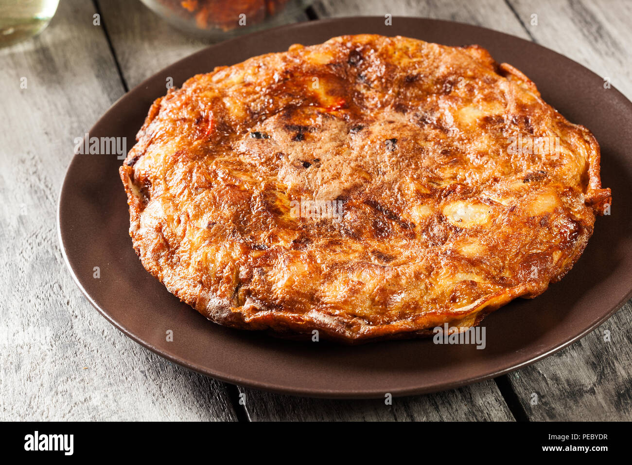 Tortilla de patatas. Spanish omelette with sausage chorizo, potatoes