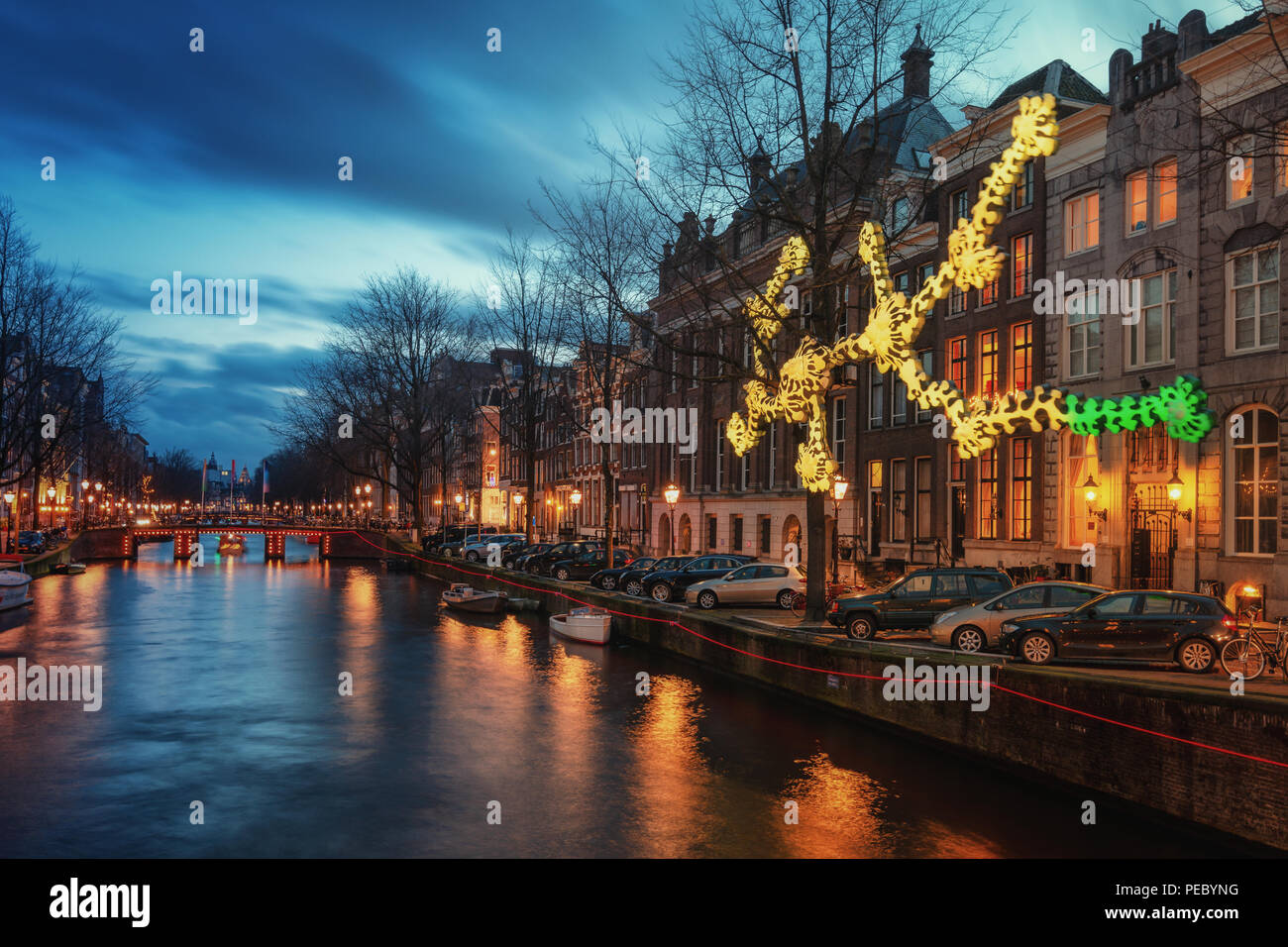 Amsterdam, The Netherlands, December 26, 2017:  Light object above the Herengracht canal during the Light Festival in Amsterdam Stock Photo
