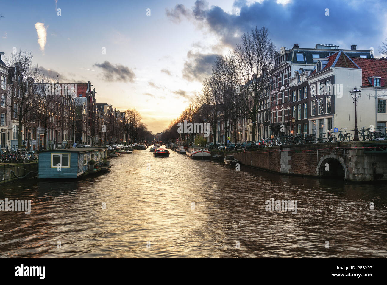 Amsterdam, The Netherlands, December 26, 2017: Canal boats in the Herengracht in the old center of Amsterdam Stock Photo