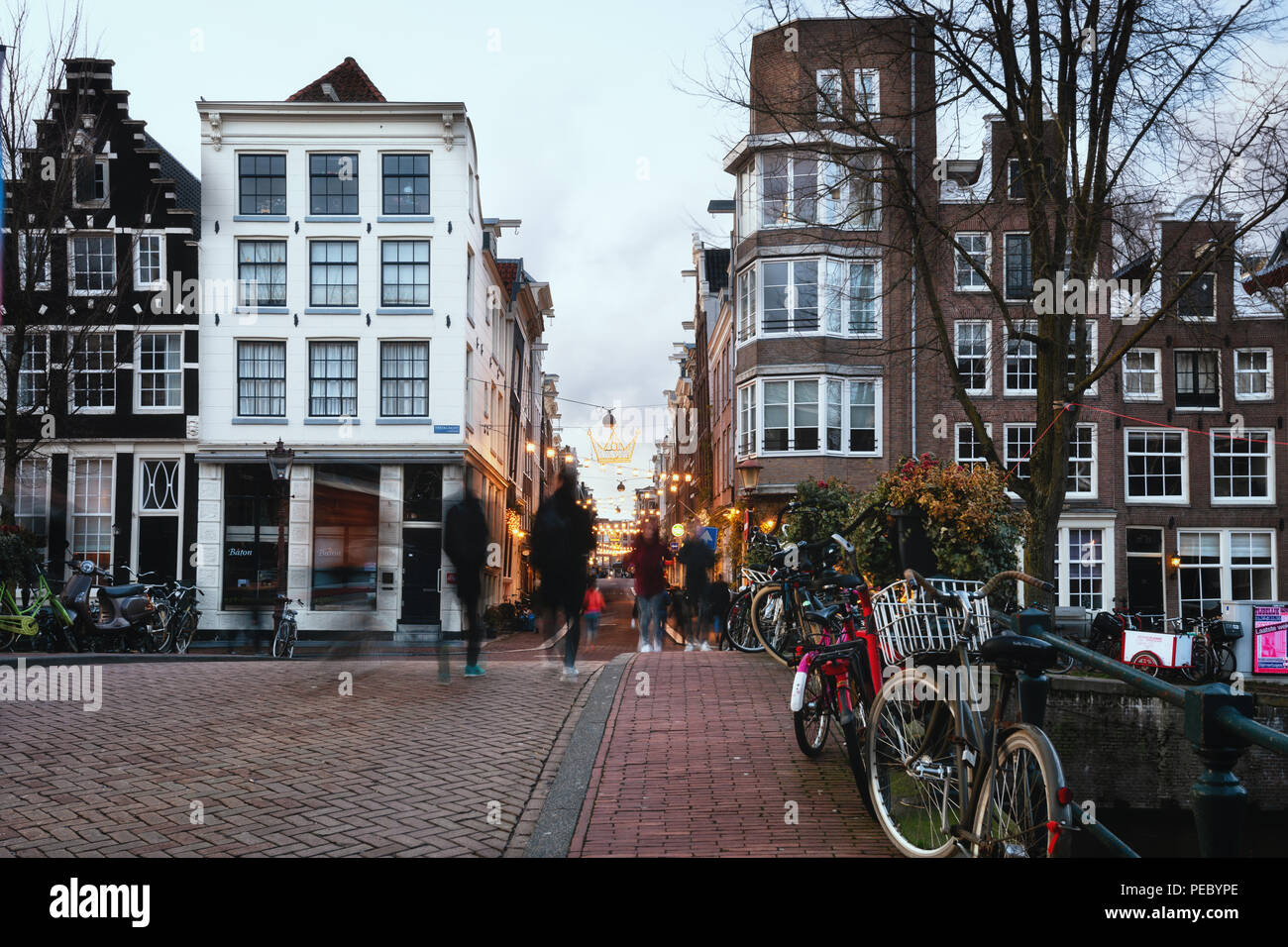 Amsterdam, The Netherlands, December 26, 2017:  Side street of the canal Herengracht in the old center of Amsterdam in Christmas spheres Stock Photo
