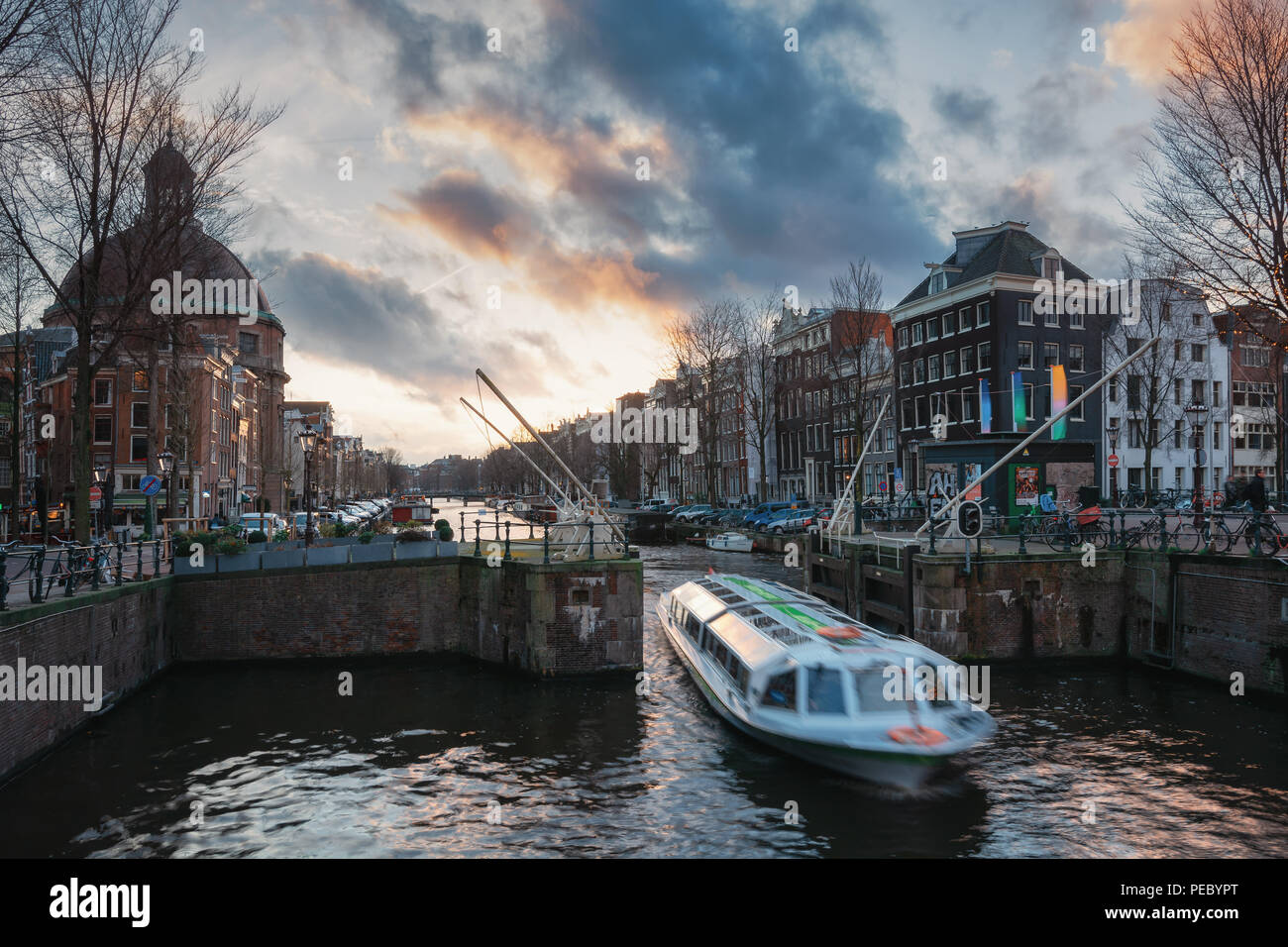 Amsterdam, The Netherlands, December 26, 2017:  The lock in The Singel canal in the old town of Amsterdam. Stock Photo