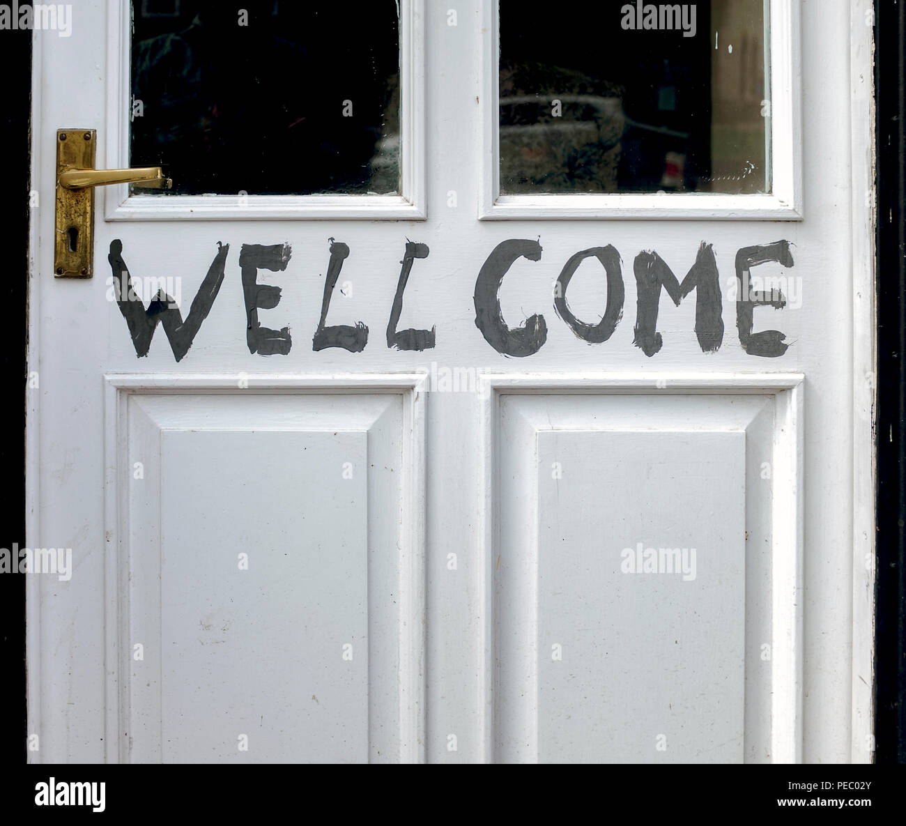 Misspelled shop doorway sign. Stock Photo