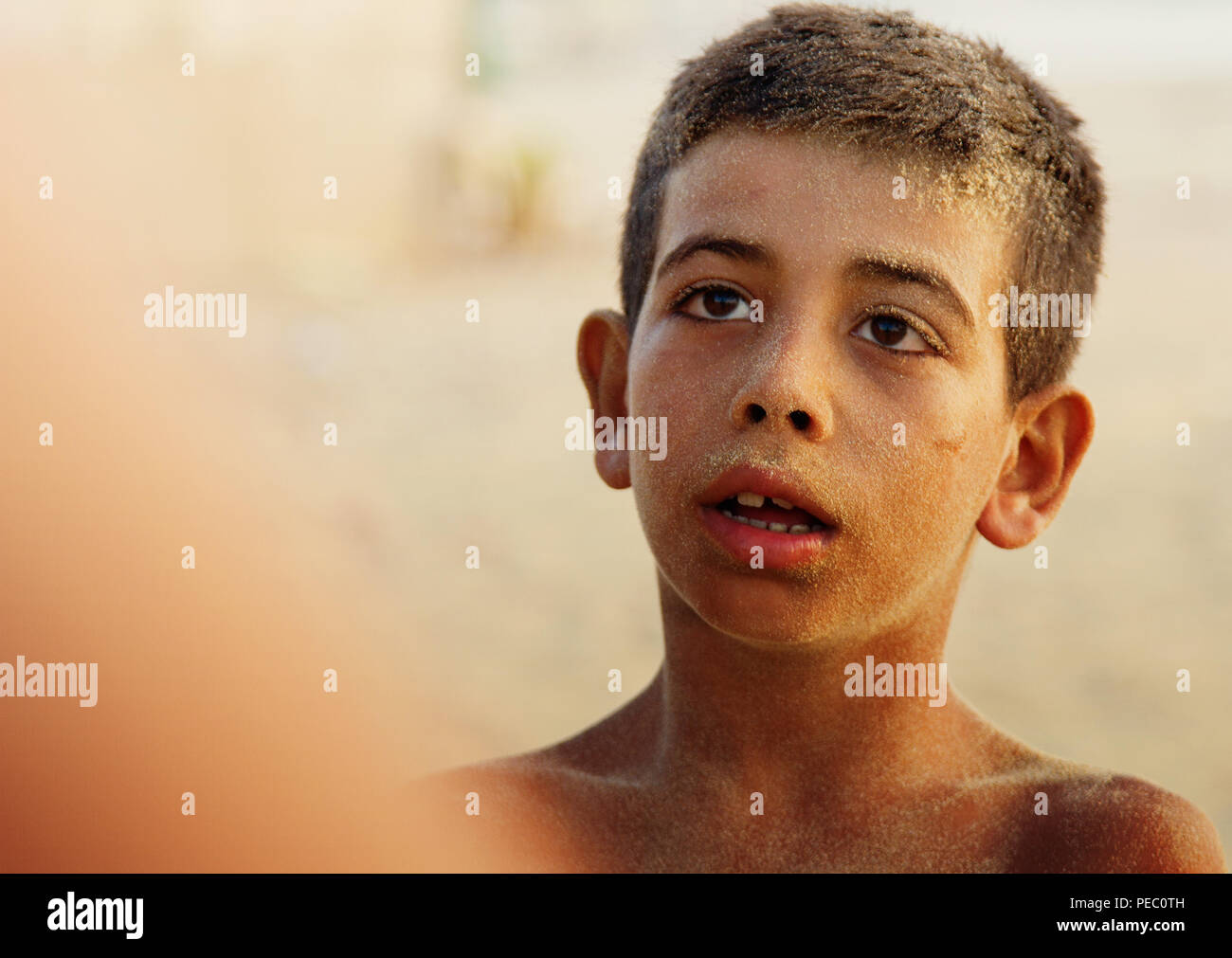 An orphan refugee in Beirut .  Saleem was only seven years old when he fled Daraa in  Syria with his family in 2013, seeking a safe haven in Lebanon. Stock Photo