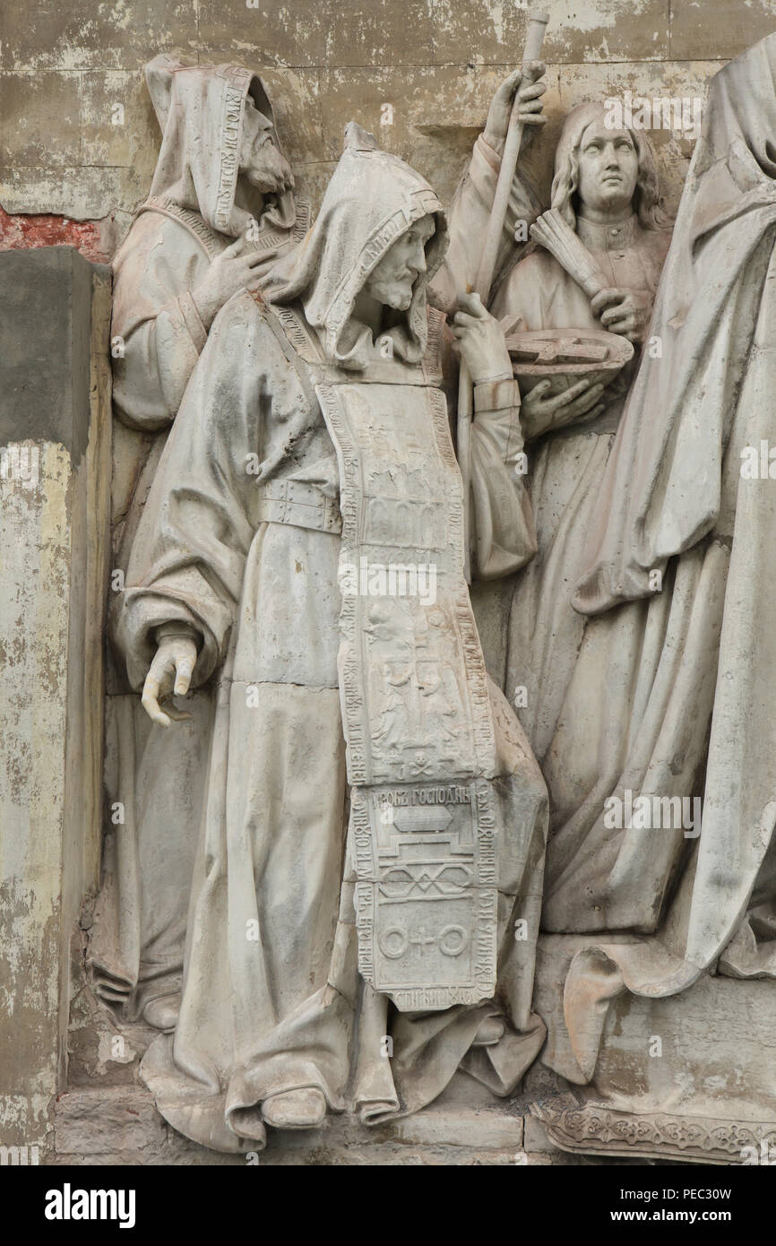 Russian monks Rodion Oslyabya and Alexander Peresvet who attended the Battle of Kulikovo against the Tatars in 1380 depicted in the detail of the original marble high relief 'Saint Sergius of Radonezh blesses Grand Prince Dmitry Donskoy of Moscow in the Trinity Monastery before the Battle of Kulikovo' by Russian sculptor Alexander Loganovsky (1847-1849) from the Cathedral of Christ the Saviour, now on display in the Donskoy Monastery in Moscow, Russia. Stock Photo