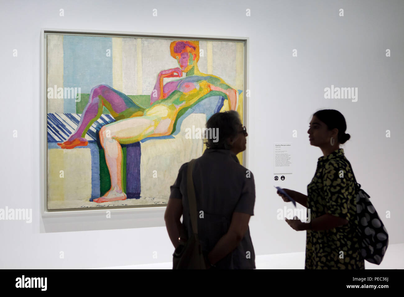 Visitors in front of the painting 'Large Nude' ('Planes by Colours') by Czech modernist painter František Kupka (1909-1910) displayed at his retrospective exhibition in the Grand Palais in Paris, France. The exhibition runs till 30 July 2018. Stock Photo