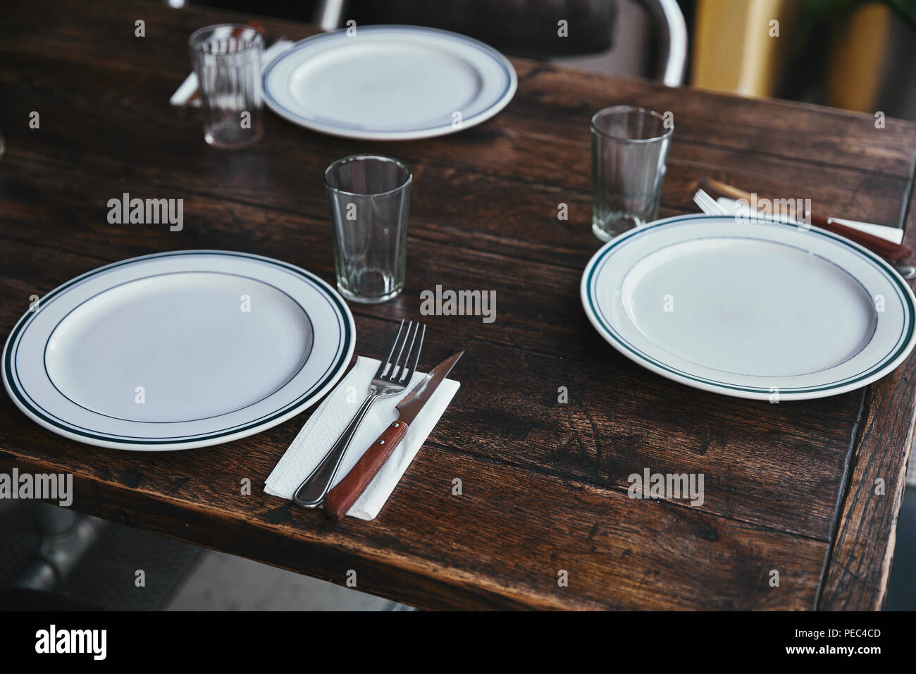 close-up shot of simple table setting at restaurant Stock Photo - Alamy