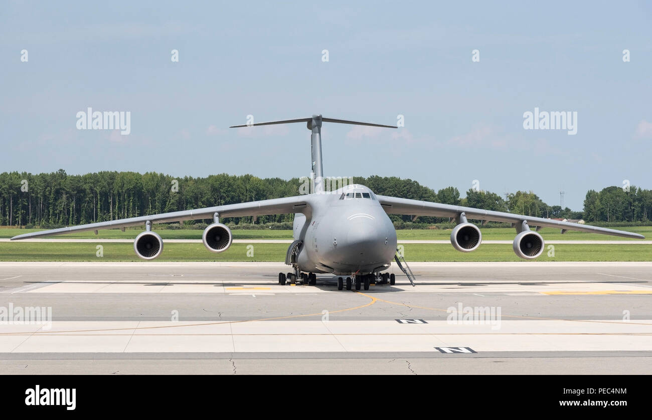 A C-5M Super Galaxy is parked on the flight line Aug. 10, 2018 at Dover Air Force Base, Del. Eighteen C-5Ms are assigned to Dover AFB. (U.S. Air Force photo by Roland Balik) Stock Photo