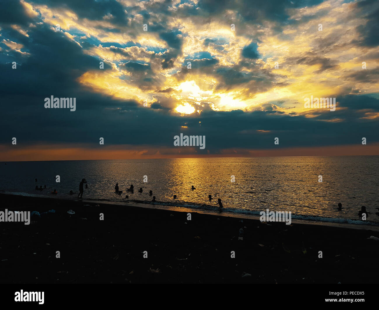 Beautiful sunset view at the beach in Bali, Indonesia Stock Photo - Alamy