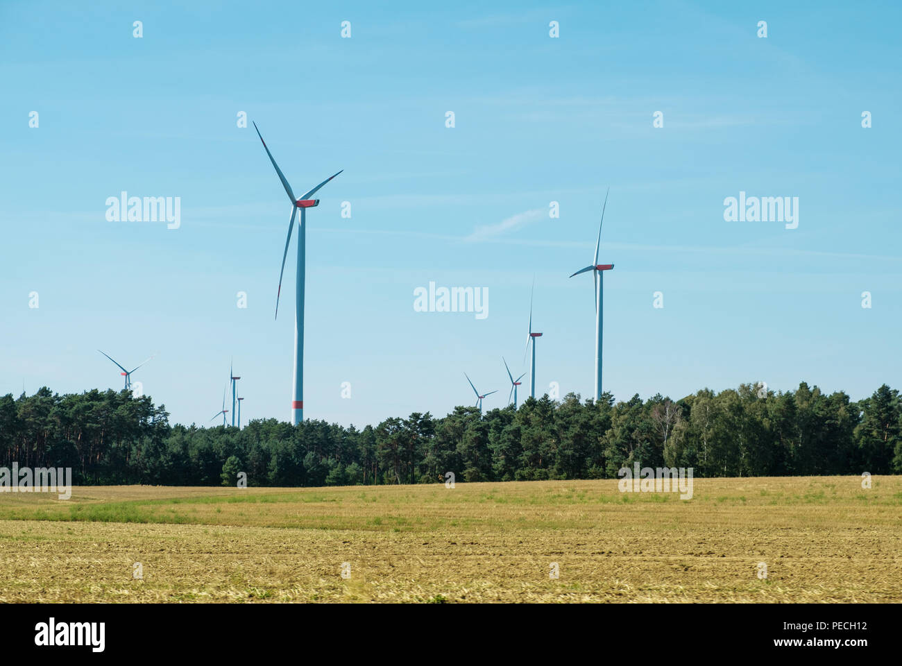 wind turbines / windmills in rural landscape - renewable energy Stock Photo