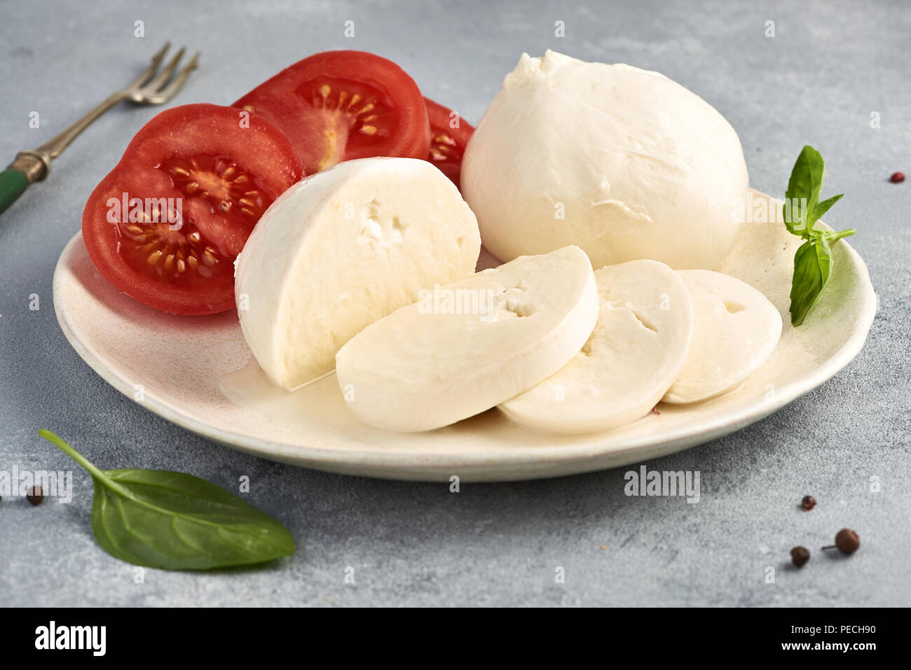 Mozzarella Buffalo with basil leaves and tomatoes Stock Photo Alamy