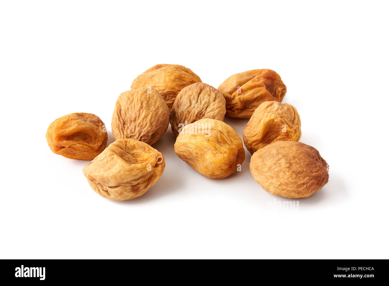 Sun dried apricots isolated on white background Stock Photo