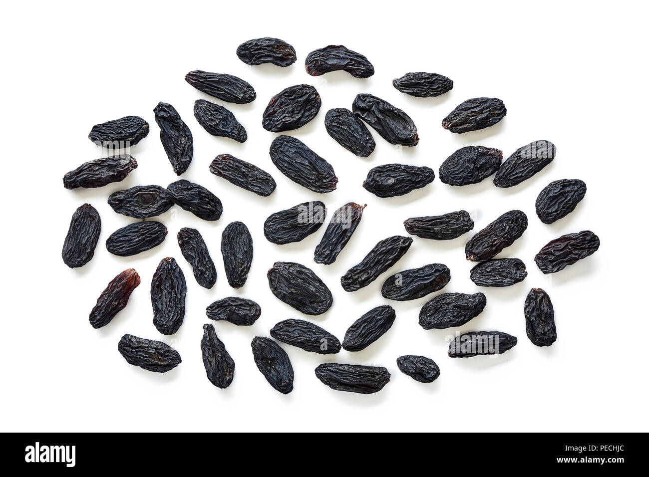 Black raisins isolated on white background. Top view of dried grapes Stock Photo Alamy