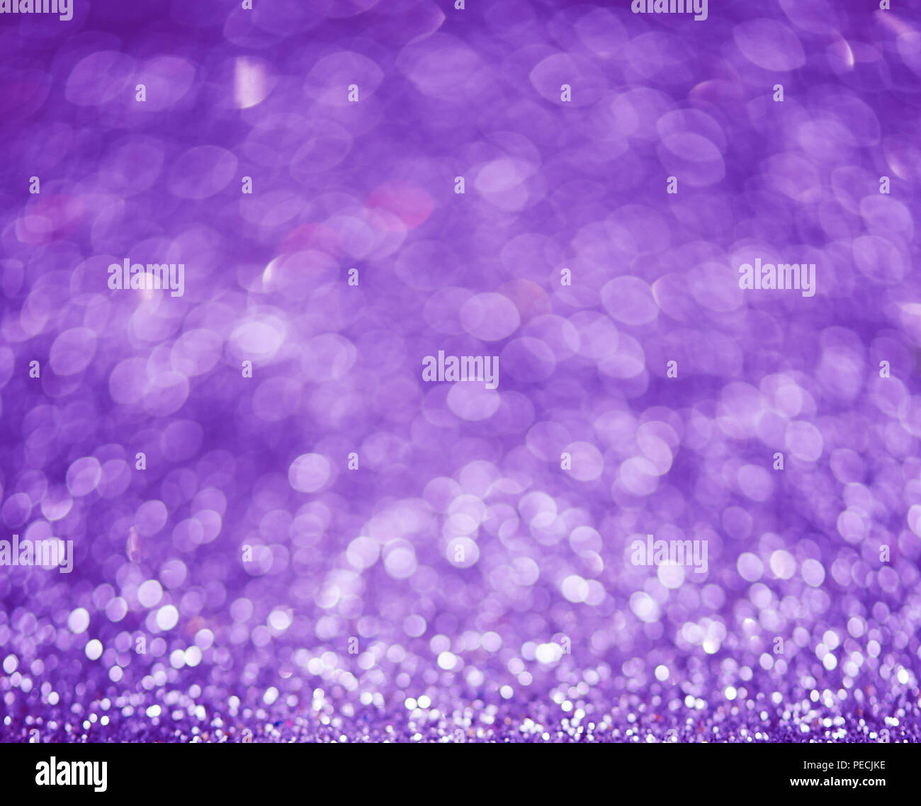 Lilac or violet bokeh background of glitter lights Stock Photo - Alamy