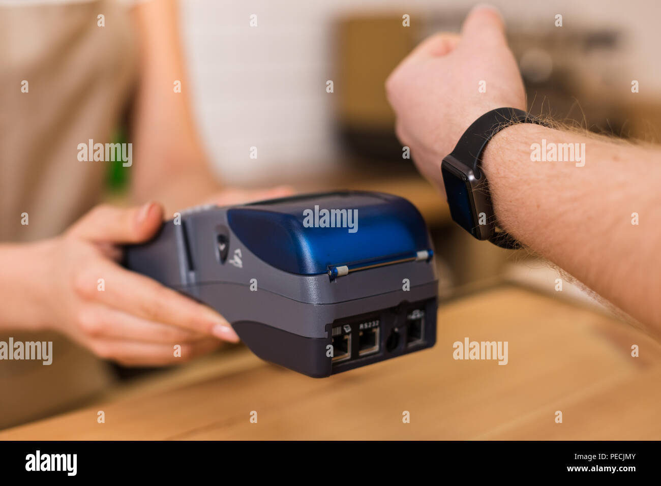 Banking system. Close up of a credit card terminal being used for ...