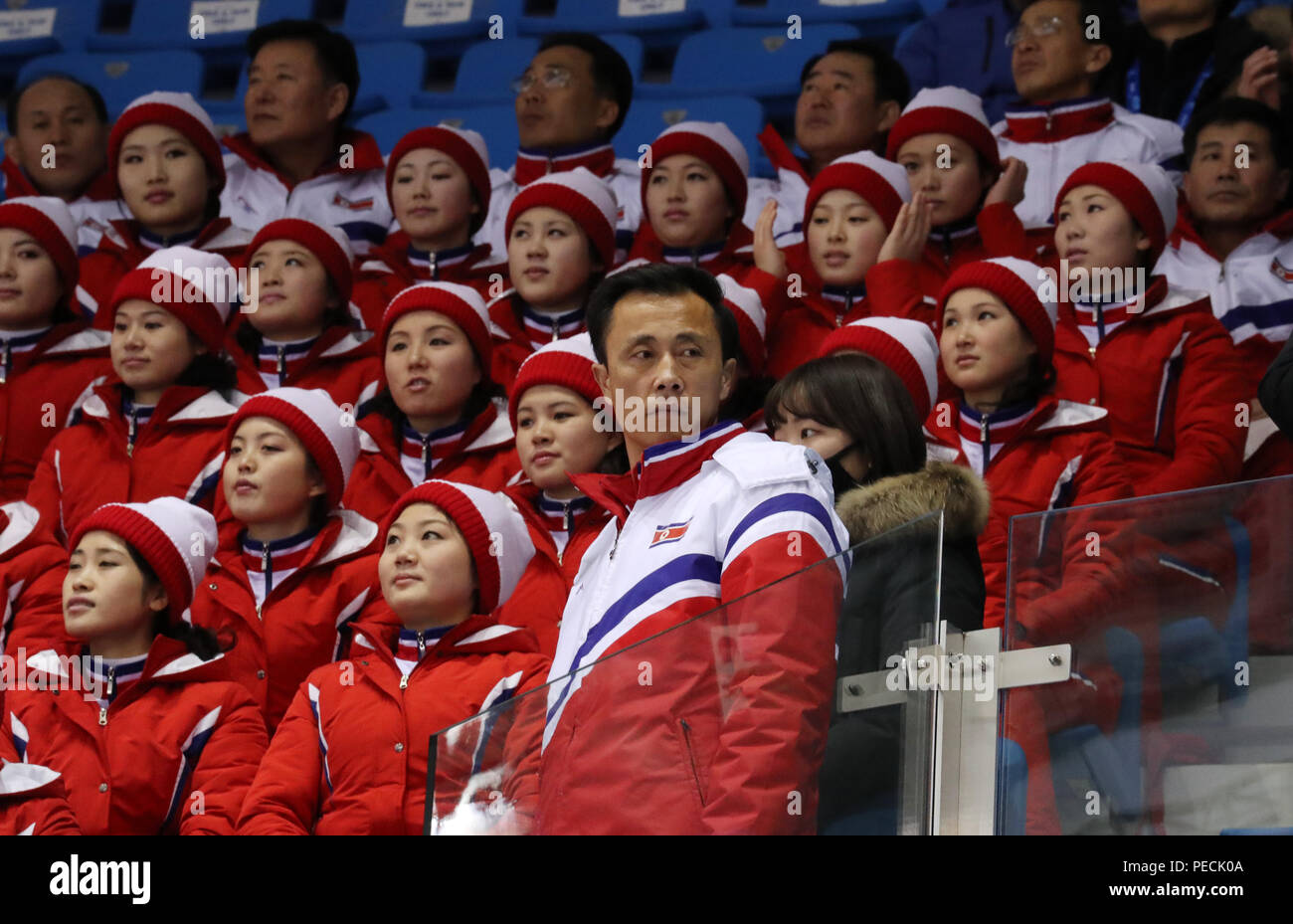 North Korea's cheering squad perform during Pair Skating Free Skating in Gangneung Ice Arena at the 2018 Winter Olympics Stock Photo