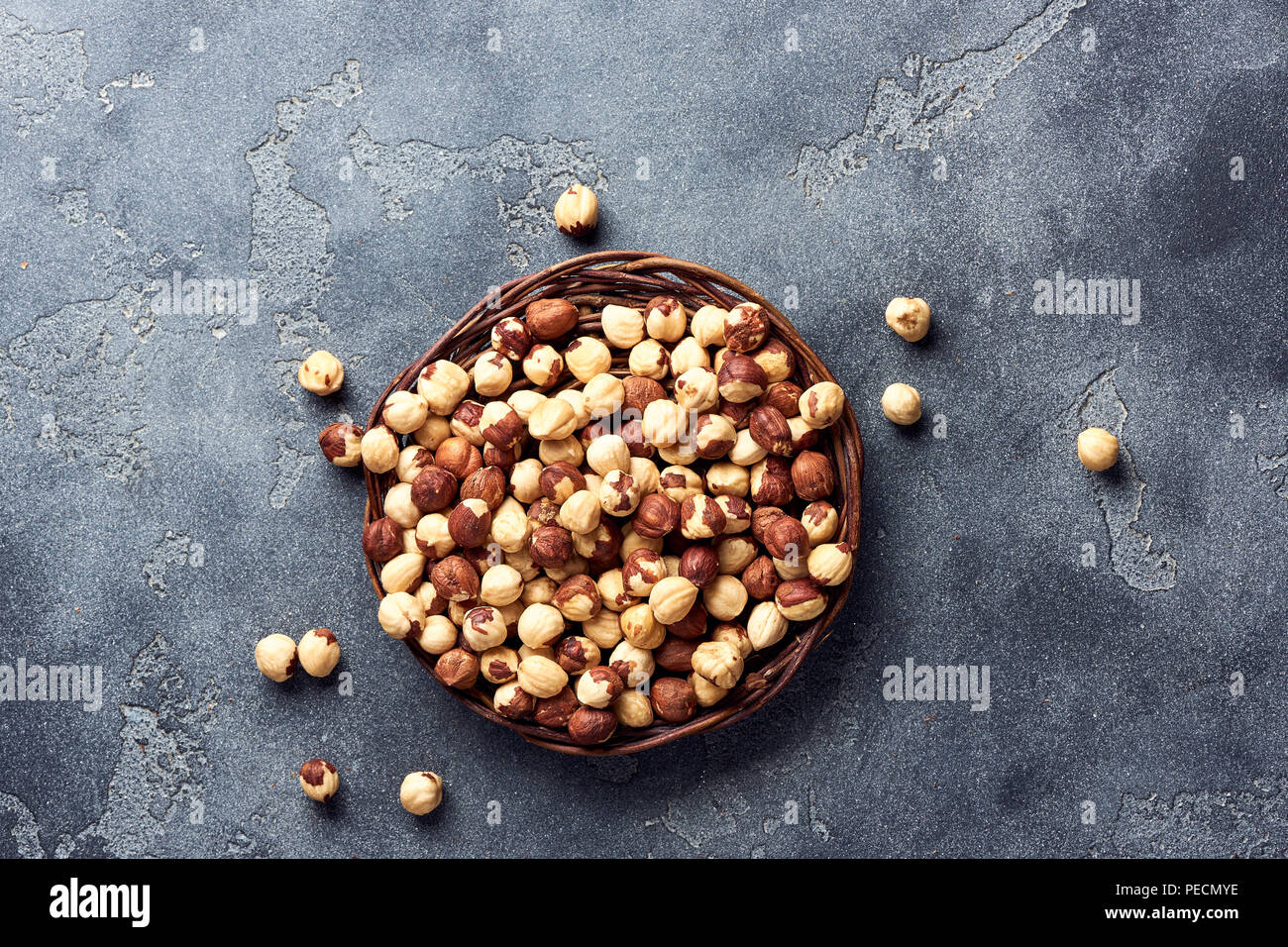 Hazelnuts on gray background. Top view. Stock Photo