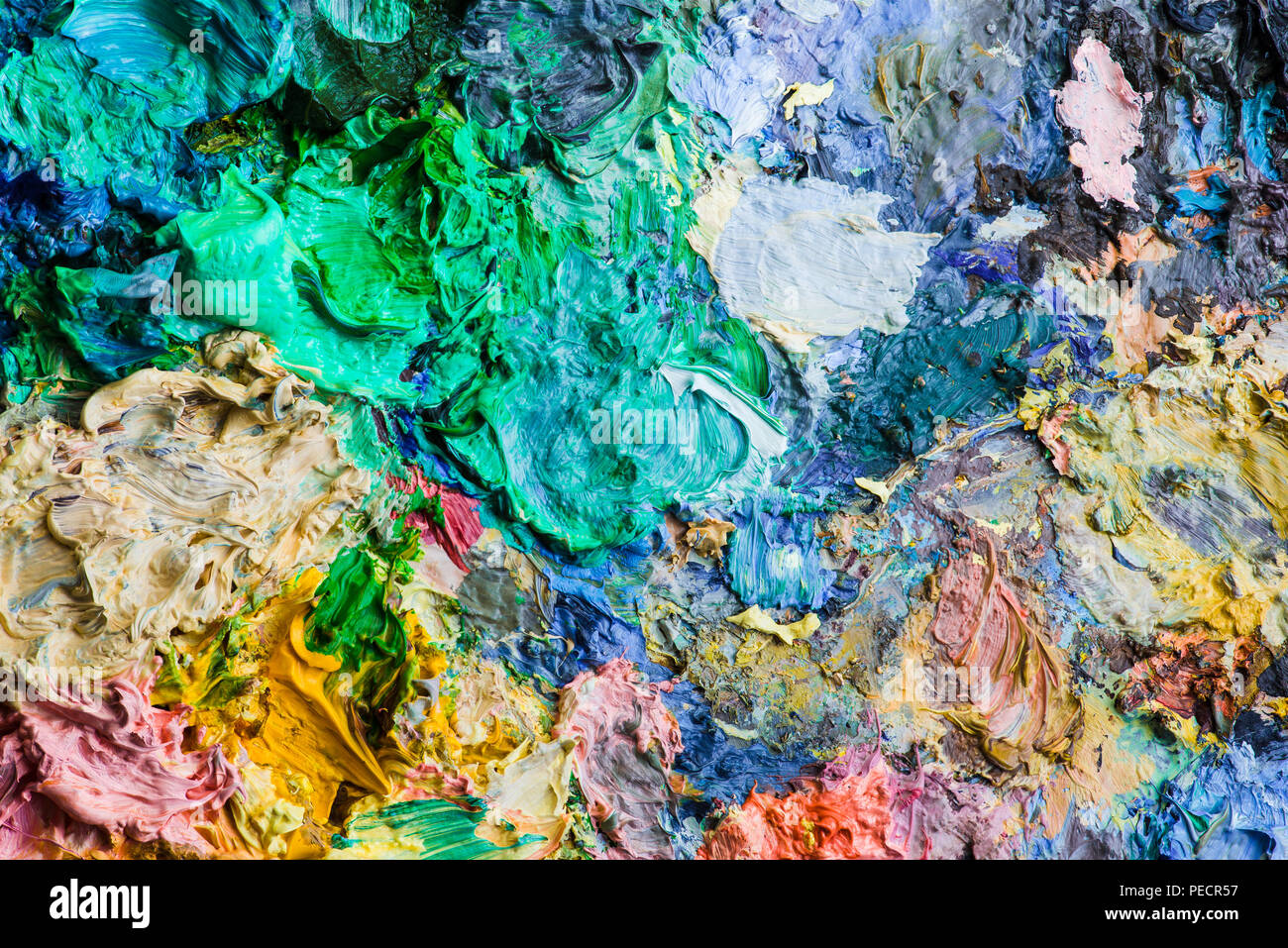 Background image of bright oil-paint palette closeup. Stock Photo