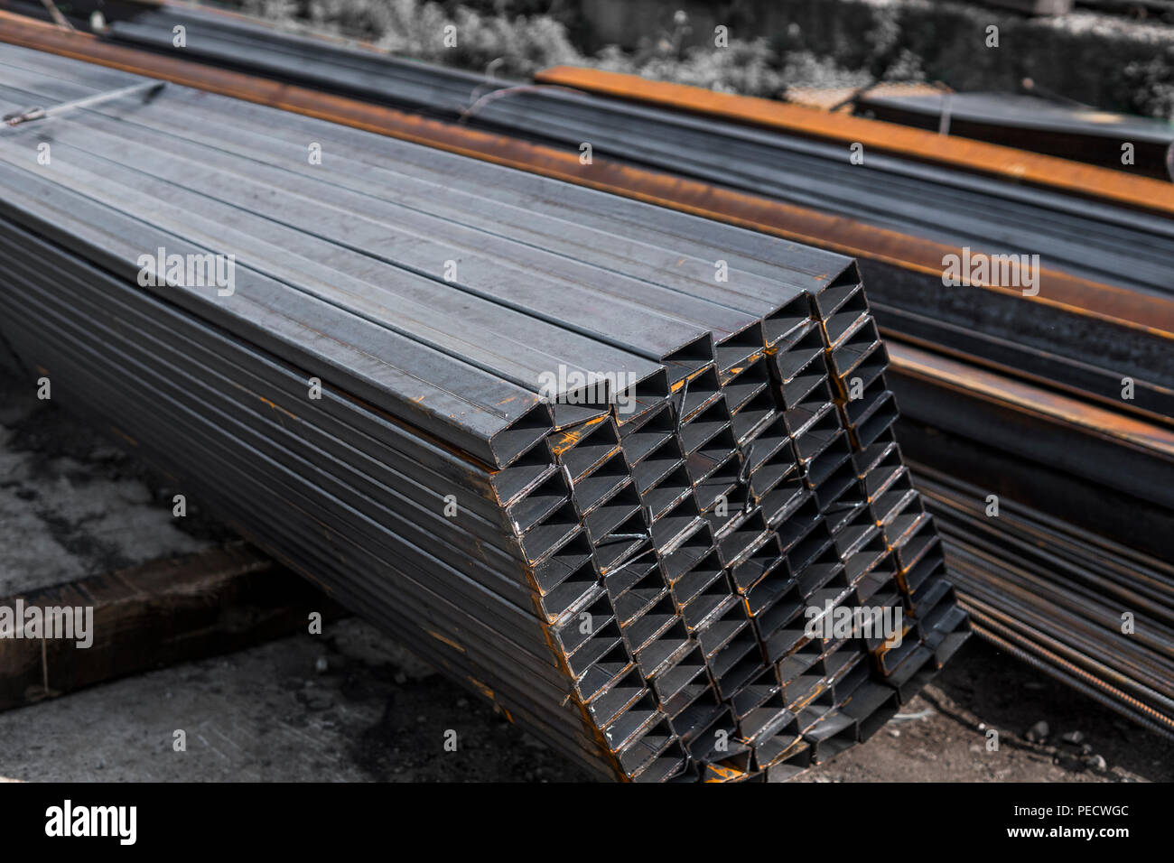 Square flatrolled pipe metal profile in packs at the warehouse of