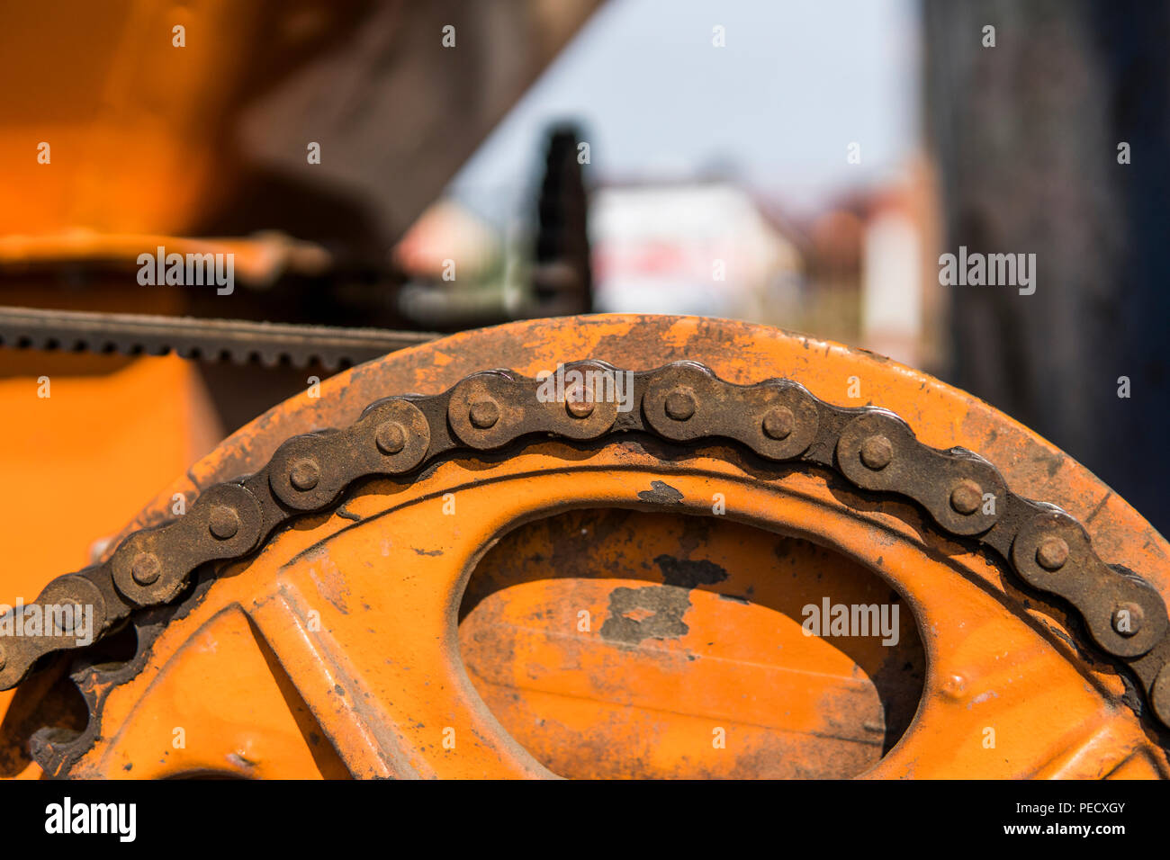 The mechanism of the chain transmission on a orange tracktor Stock