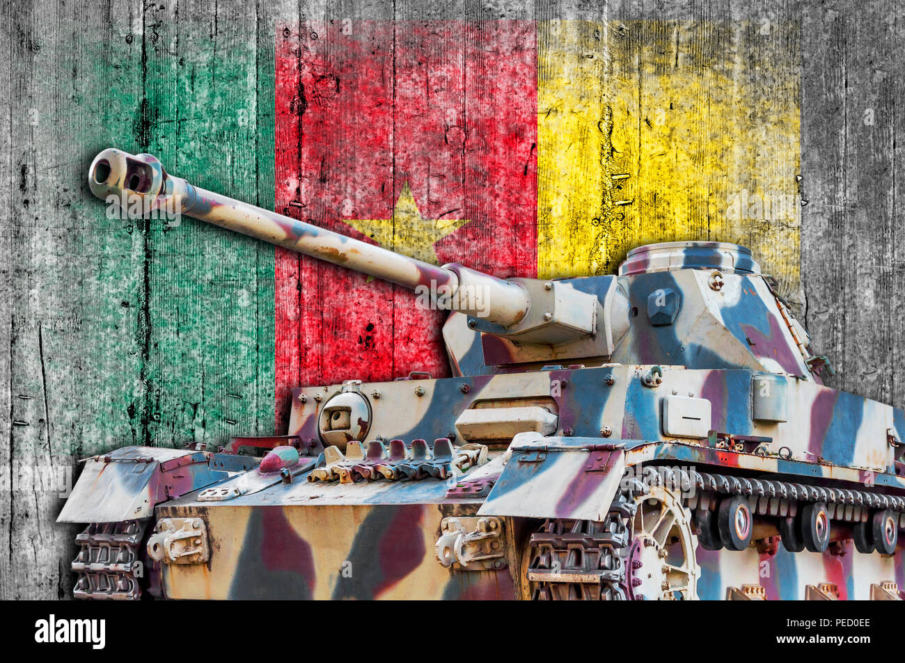 Military tank with concrete Cameroonian flag Stock Photo