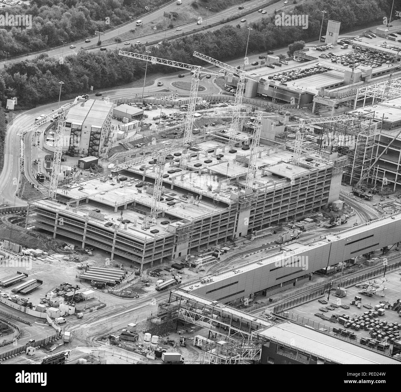 Manchester Airport aerial photo over new terminal construction project