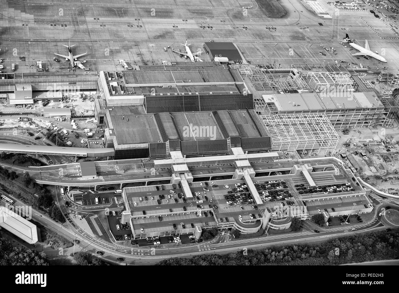 Manchester Airport aerial photo over new terminal construction project
