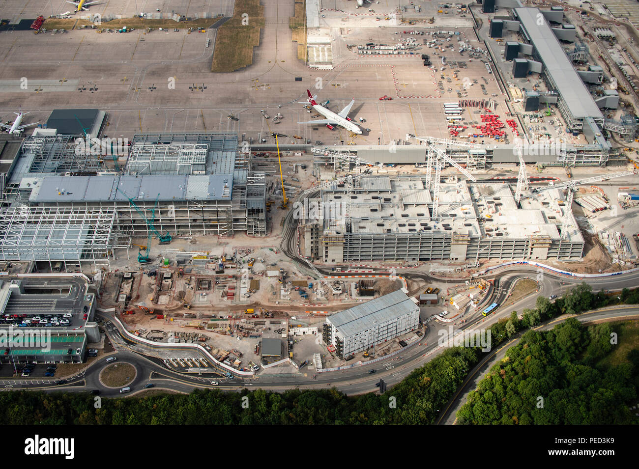 Manchester Airport aerial photo over new terminal construction project