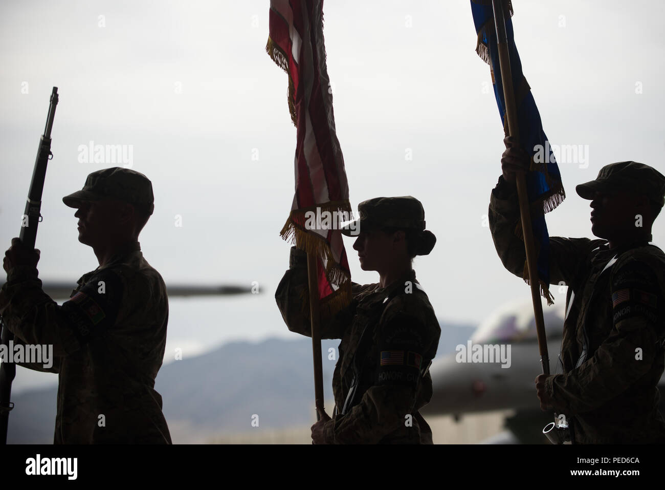 U.S. Airmen with the Bagram Air Field Honor Guard participate in the 455th Expeditionary Mission Support Group change of command ceremony at Bagram Air Field, Afghanistan, Aug. 3, 2015. The 455th MSG is comprised of five squadrons responsible for communications, civil engineer operations, force support, logistics readiness, and security forces. (U.S. Air Force photo by Tech. Sgt. Joseph Swafford/Released) Stock Photo
