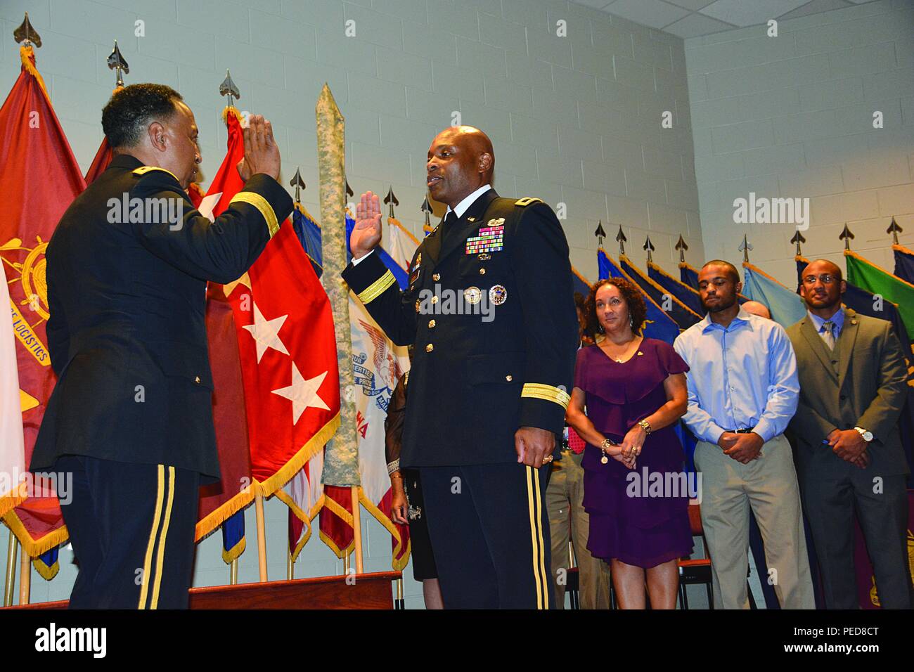Newly Promoted Brig Gen Michel M Russell Sr Chief Of Transportation Recites The Oath Of Officer After Gen Dennis L Via Commanding General Army Materiel Command Left As Russell S Wife Sieglinde And alamy