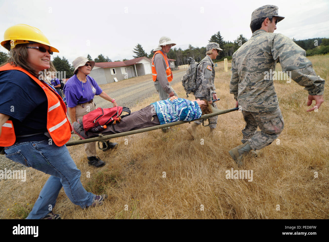 Military and civilian first responders conduct a simulated casualty ...
