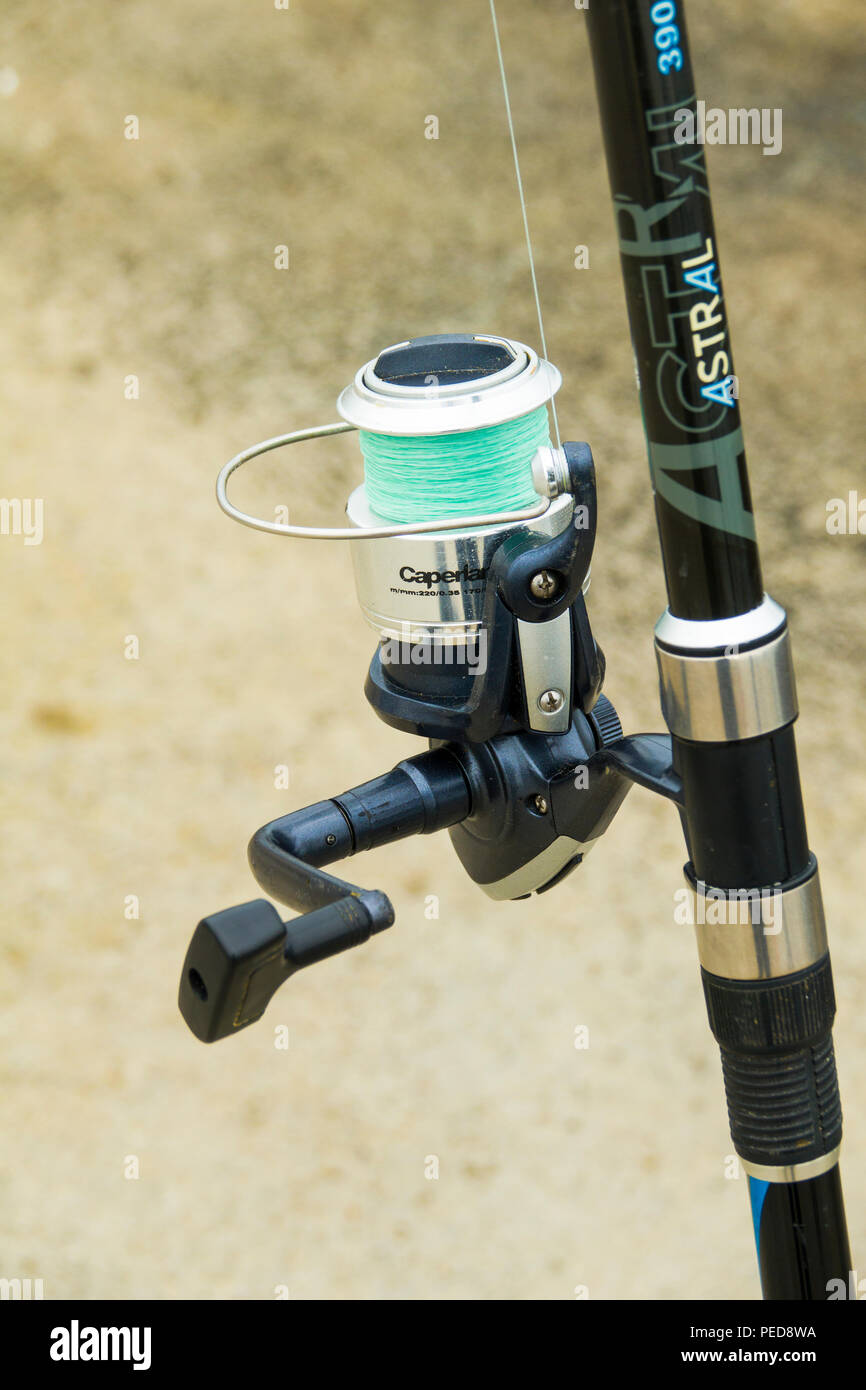 Fishing pole with line and reel Stock Photo