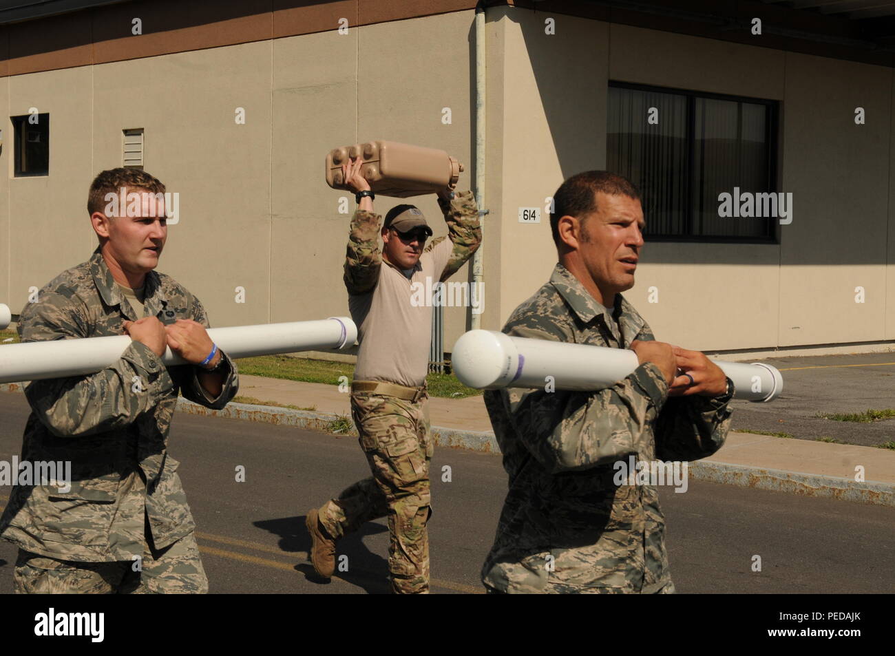 Future Joint Terminal Attack Controllers (JTAC) with the 274th Air Support Operations Squadron (ASOS) undergo rigorous physical training prior to attending their first formal technical school while at Hancock Field, Syracuse, N.Y. Aug.8. The National Guard Bureau's 'One-Level Program' has directed all Air National Guard Air Support Squadrons to prepare their airmen both physically and academically to help ensure their future success while enrolled in the JTAC apprentice program.  (New York Air National Guard Tech. Sgt. Justin A. Huett/Released) Stock Photo