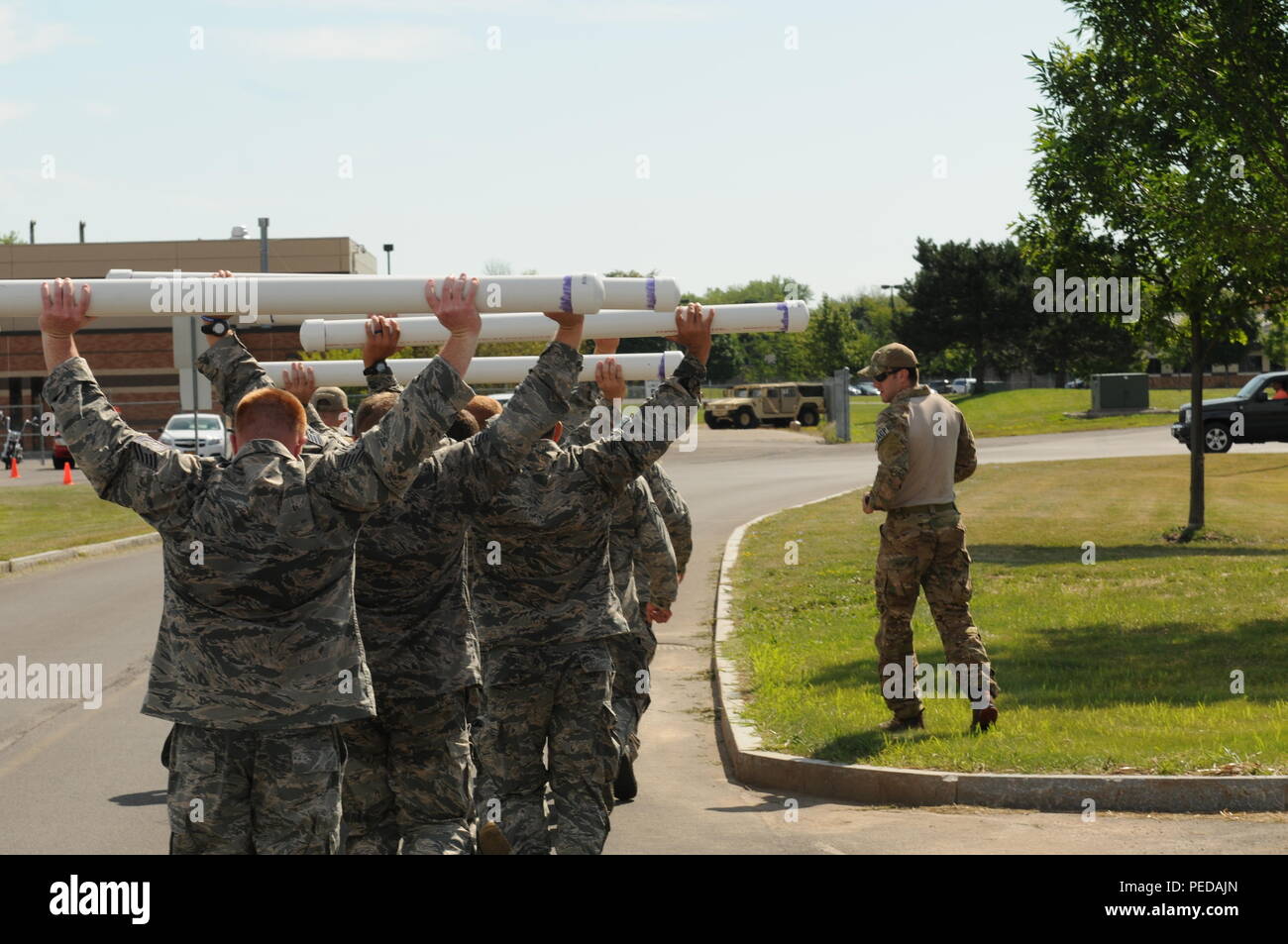 Future Joint Terminal Attack Controllers (JTAC) with the 274th Air Support Operations Squadron (ASOS) undergo rigorous physical training prior to attending their first formal technical school while at Hancock Field, Syracuse, N.Y. Aug.8. The National Guard Bureau's 'One-Level Program' has directed all Air National Guard Air Support Squadrons to prepare their airmen both physically and academically to help ensure their future success while enrolled in the JTAC apprentice program.  (New York Air National Guard Tech. Sgt. Justin A. Huett/Released) Stock Photo