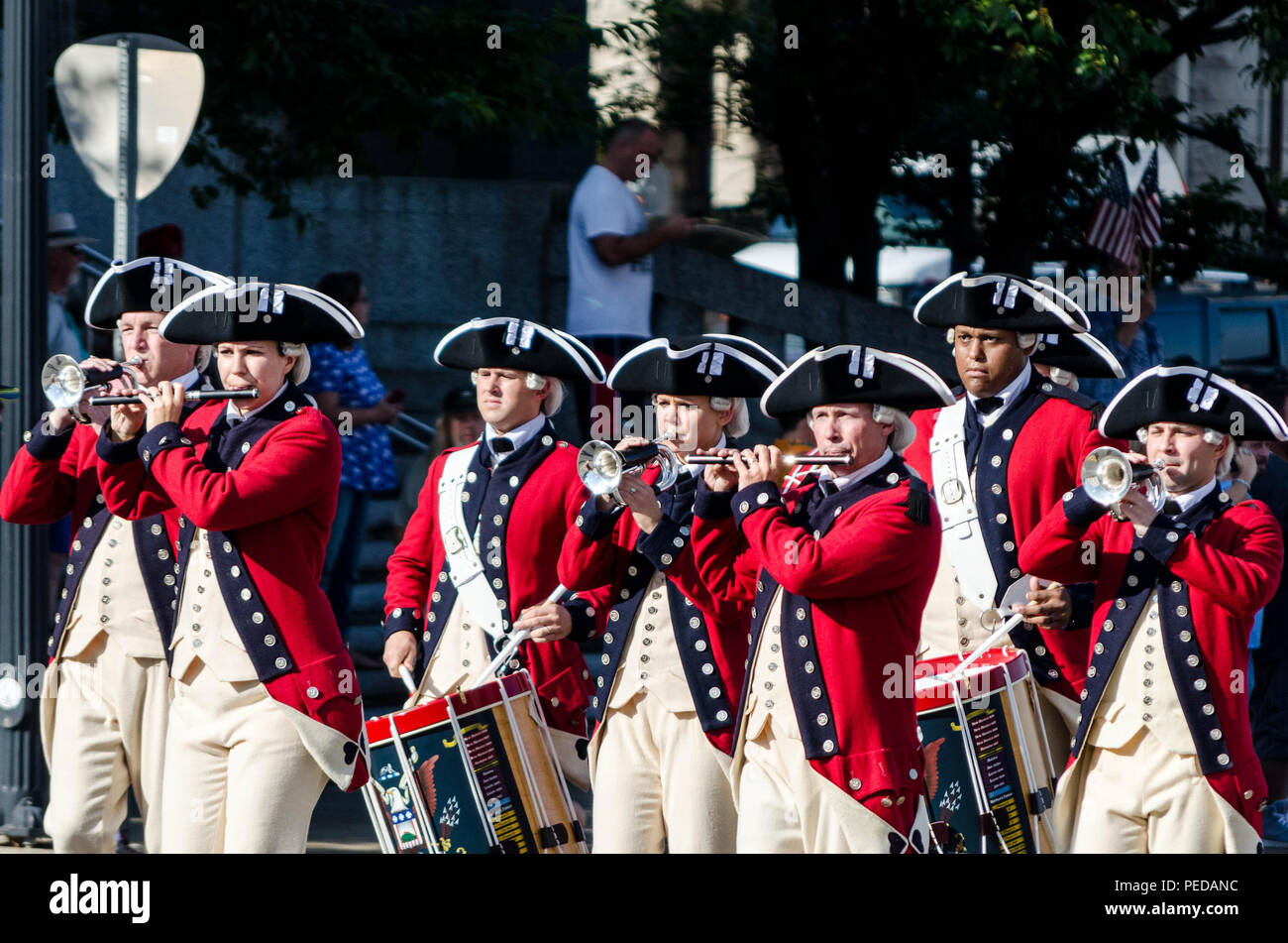 Participants dressed in uniforms from the American Revolution lead the Heroes Honoring Heroes Parade in Nashville, Tenn., Aug. 8, 2015. Stock Photo