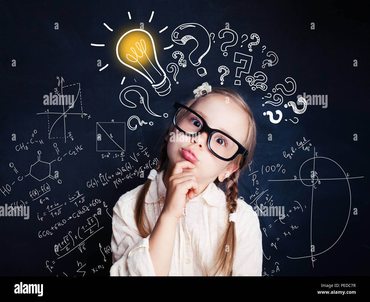 Small child mathematics student thinking on background with lightbulb